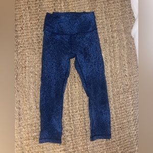 Lululemon leggings.  Color blue/black pattern. Size 4